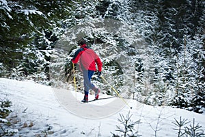 Young man cross-country skiing