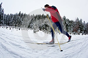 Young man cross-country skiing