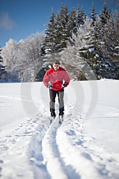 Young man cross-country skiing