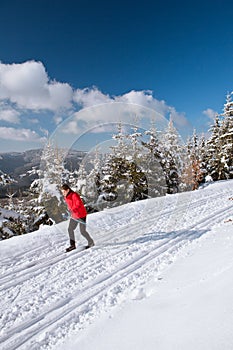 Young man cross-country skiing