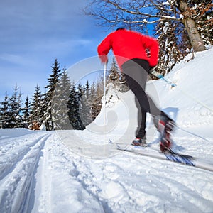 Young man cross-country skiing