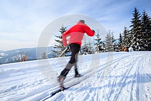 Young man cross-country skiing