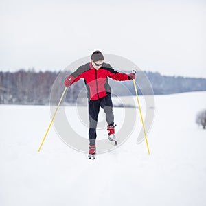 Young man cross-country skiing