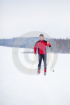 Young man cross-country skiing