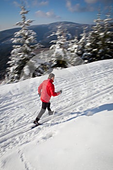 Young man cross-country skiing