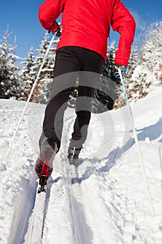 Young man cross-country skiing