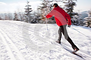 Young man cross-country skiing