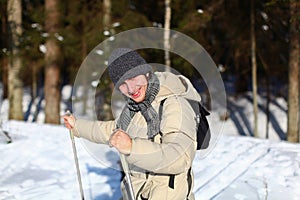 Young man cross-country skiing closeup