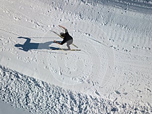 Young man cross-country skiing on a winter day