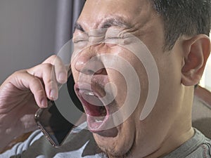 Young Man Crying To Get Bad News on Phone