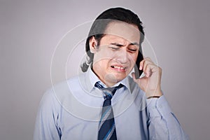 Young Man Crying To Get Bad News on Phone