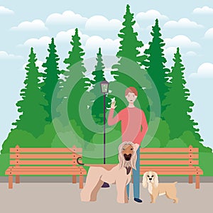 Young man with cute dog mascot in the park