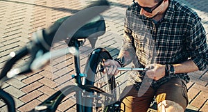 Young Man Cyclist Pumping Wheel Bike, Preparing For Trip, Maintenance Transport Concept