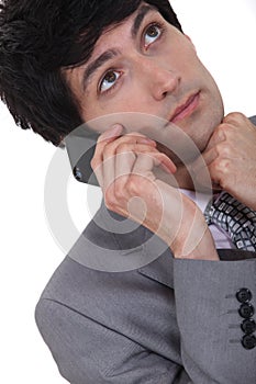 Young man daydreaming