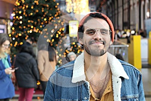 Young man in department store during Christmas season