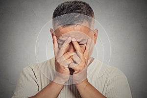 Young man with depressed face expression