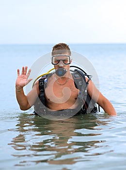 Young man in a diving suit