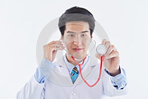 Young man doctor posing with a stethoscope