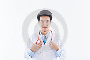 Young man doctor posing with a stethoscope