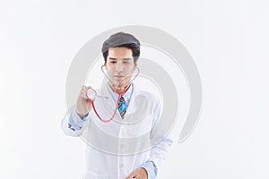 Young man doctor posing with a stethoscope