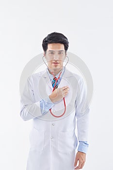 Young man doctor posing with a stethoscope