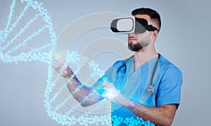 Young man doctor wearing VR glasses in future of healthcare conducts precise CRISPR edits on virtual DNA