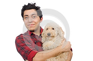 The young man with dog isolated on white