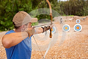 Man practicing archery photo