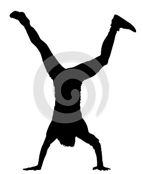 Young man doing cartwheel. Sportsman in handstand position silhouette.
