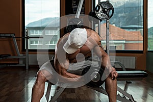 Young Man Doing Exercise For Biceps