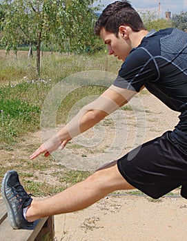 Young man doing exercise.
