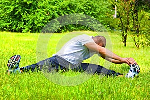 Young man doing his streches