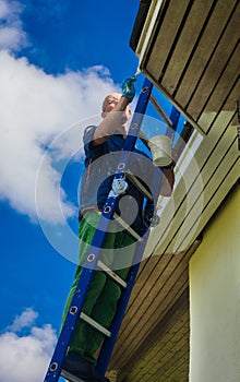 Young man doing house repairs