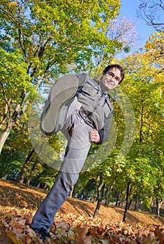 Young man doing kick to the camera