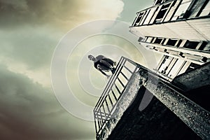 Young man doing parkour in the city