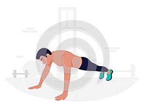 Young man doing plank exercise. Core workout