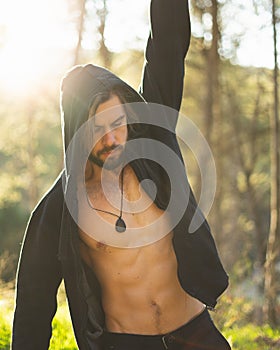 Young man doing pull ups