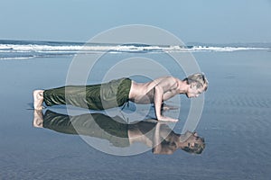 Young man doing push ups