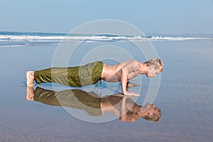 Young man doing push ups