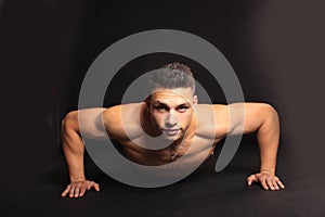 Young man doing push ups