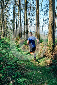 Young man doing trail