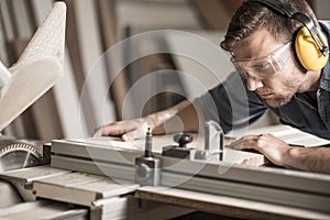 Young man doing woodwork