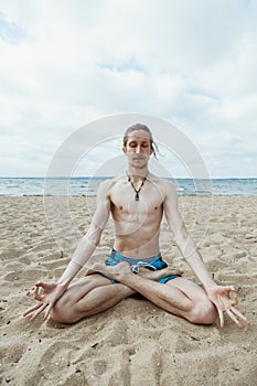 Young man doing yoga