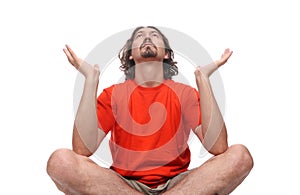 Young man doing yoga exercise