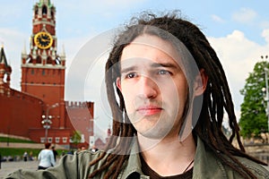 Young man with dreadlock hair.