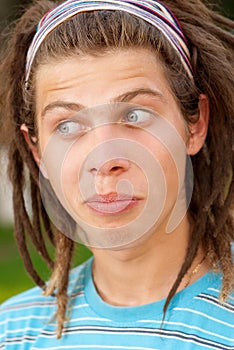 Young man with dreadlocks