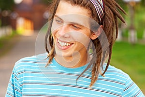 Young man with dreadlocks