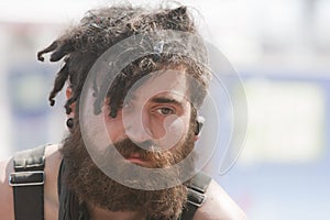 Young man with dreadlocks