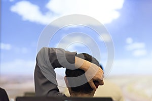 Young man dreaming clouds on presentation