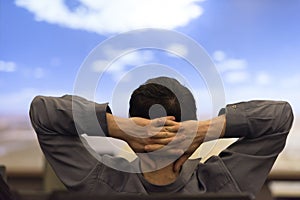 Young man dreaming clouds on presentation